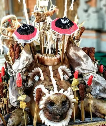 Gayah Bali's Meticulous Meat Offering CARD