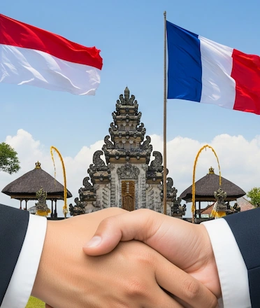 Symbolism of Bali-Franch Strengthen Connection; handshake, flag and Bali's nature as background