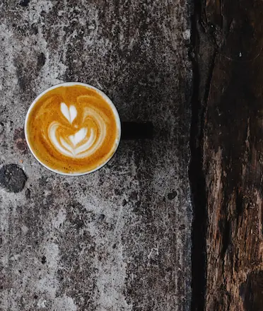CARD-Sized Image of Coffee on a Rustic Table in Bird Eye View