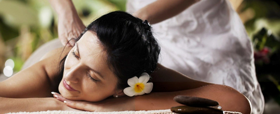Woman Getting Luxury Spa Massage in Lush Nature Surroundings