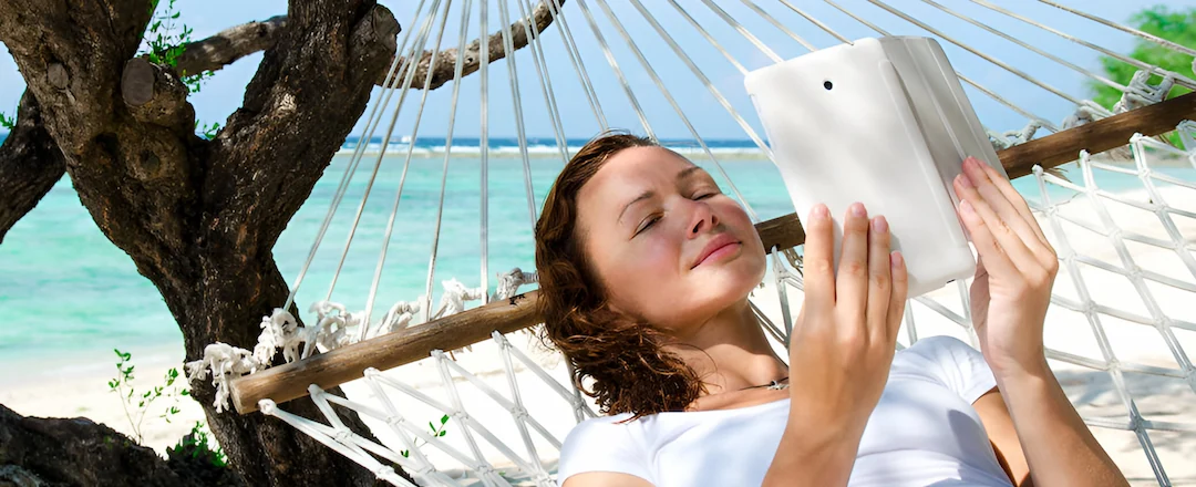 Caucasian Woman Chilling On A Hammock On Bali Beach