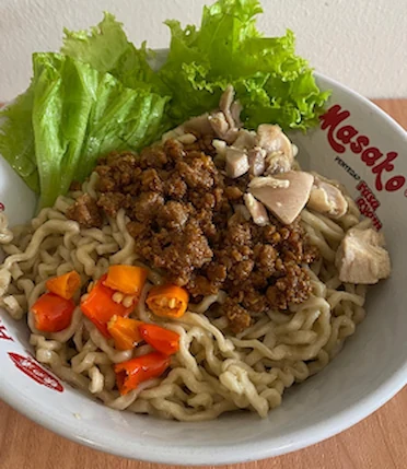 a bowl of bakmi noodles