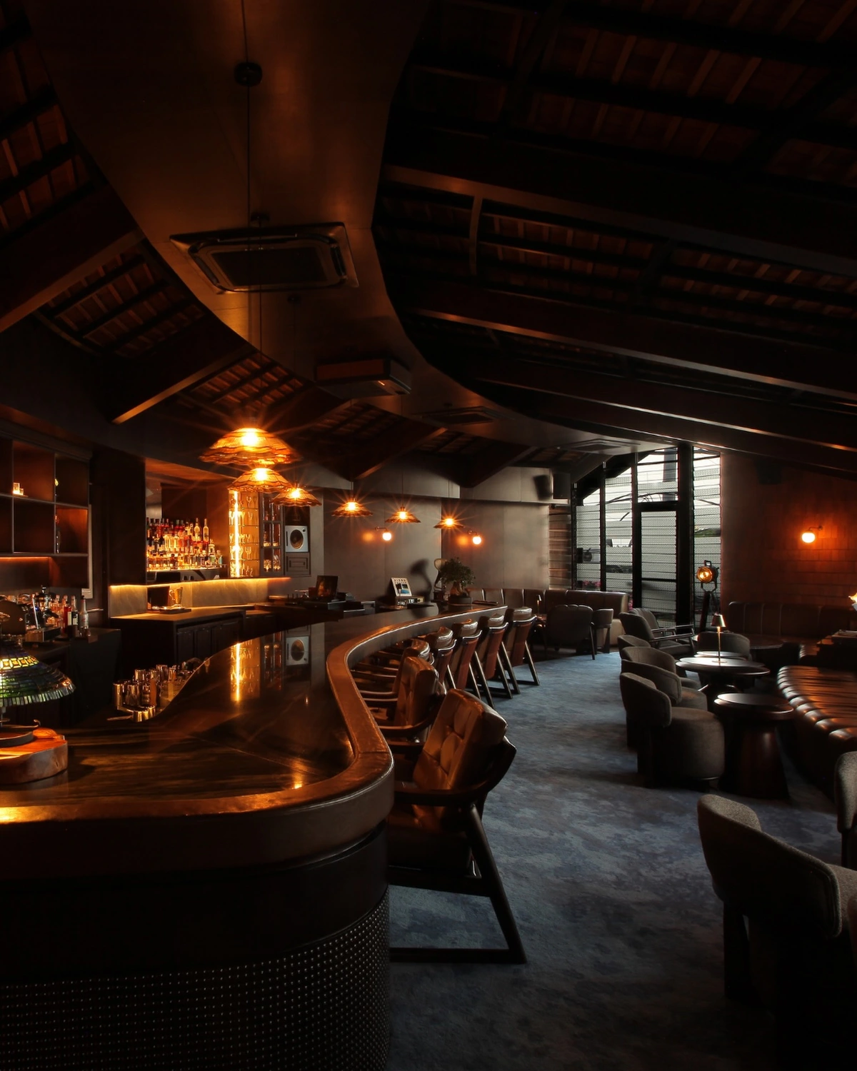 A Speakeasy bar with dim lighting at Petitenget Bali