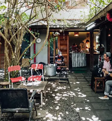 Rustic hidden cafe courtyard with outdoor seating