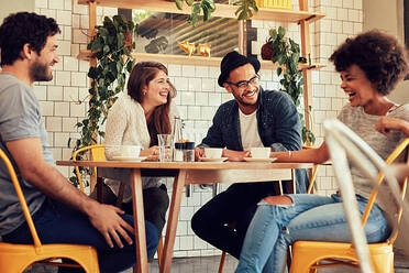 group of people hang out in a cafe