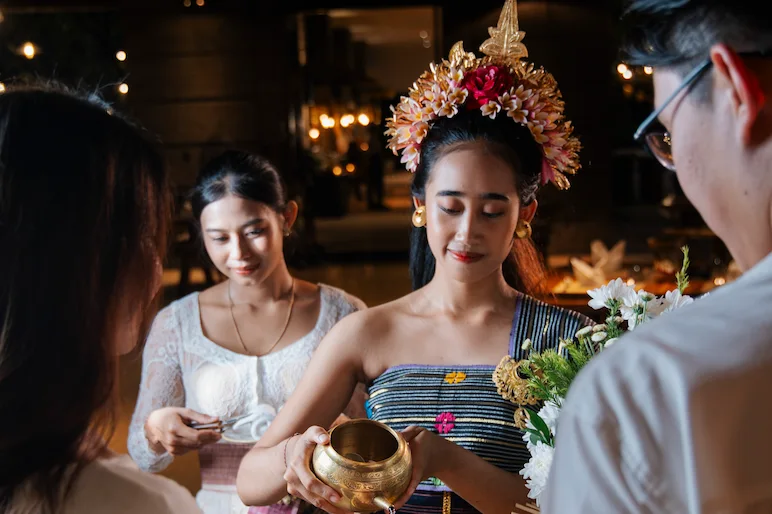 Balinese dancer pour the holy water