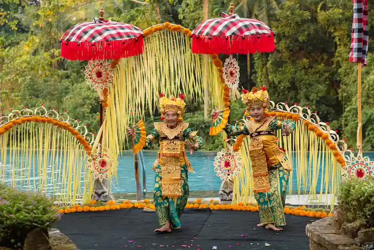 two balinese dancer perform