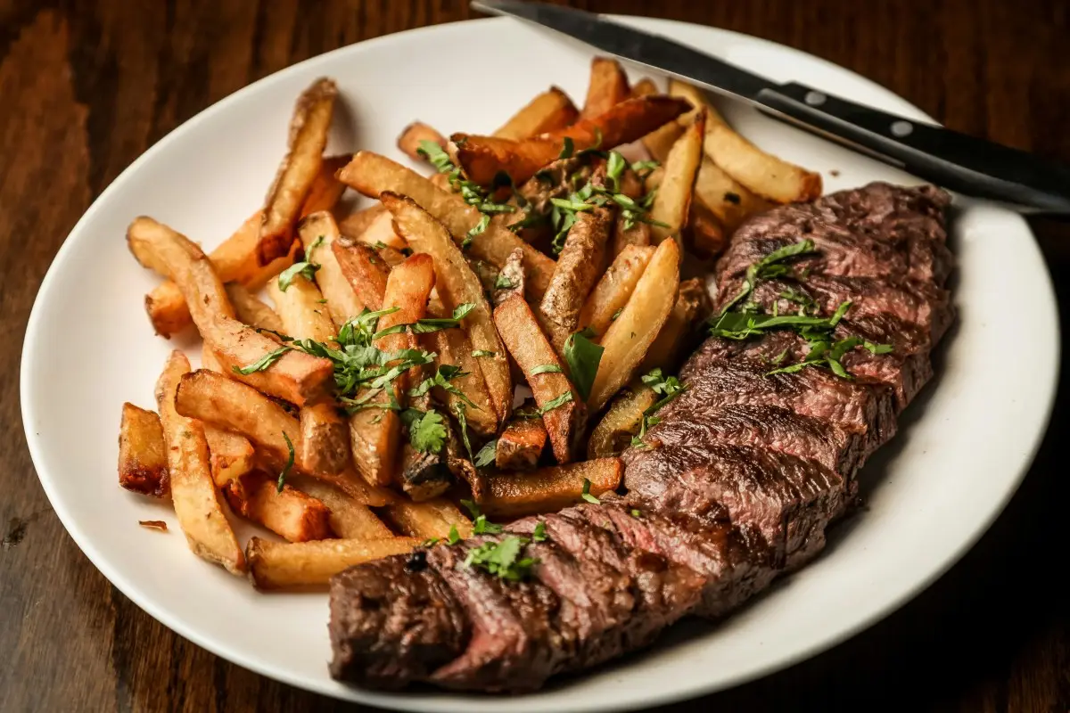 steak with fries on a plate