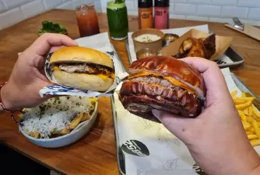 two burgers two hands