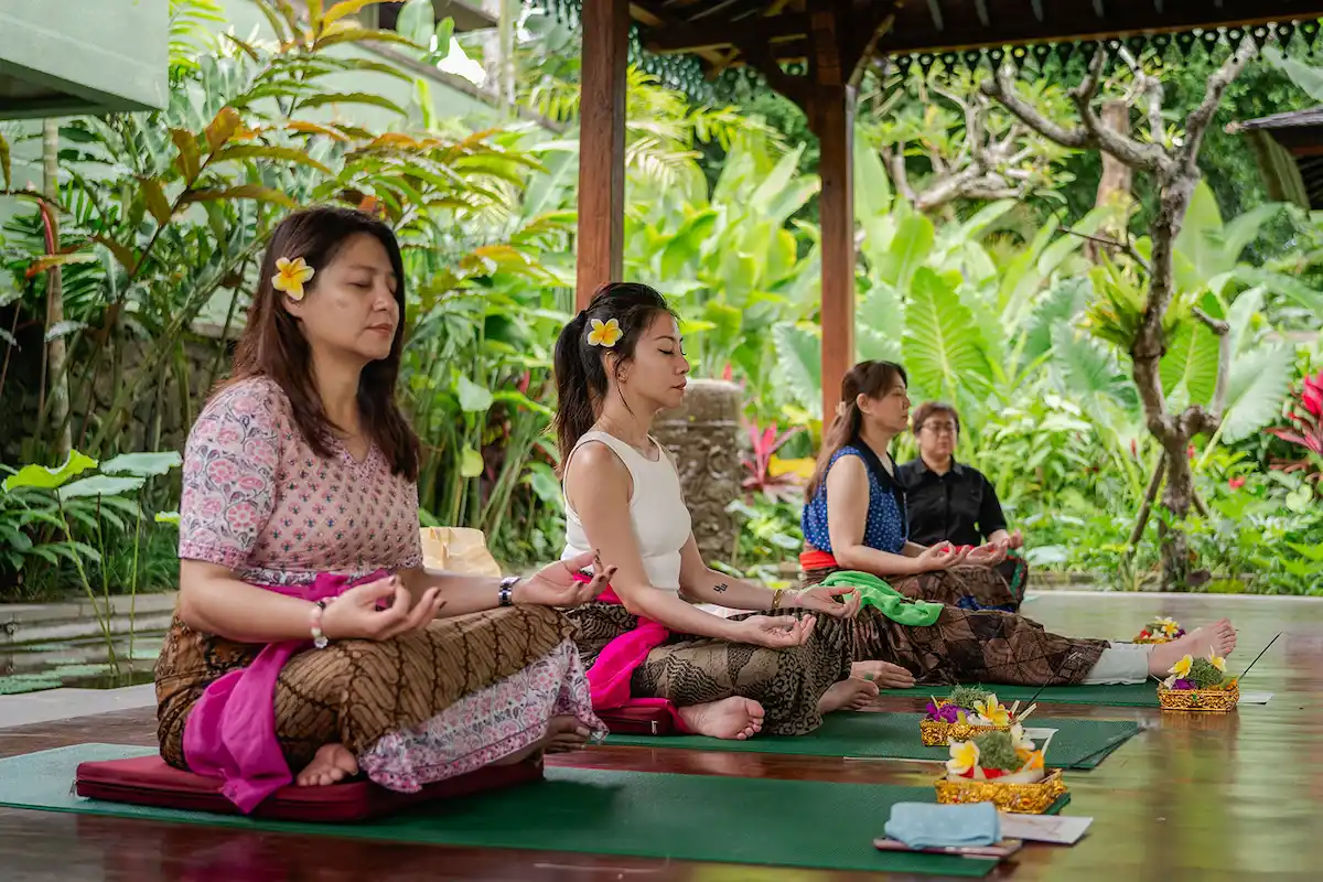 Group of people doing meditation