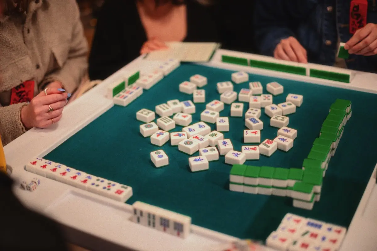 playing mahjong on the table