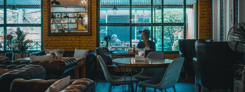A_woman_sits_alone_in_a_cafe