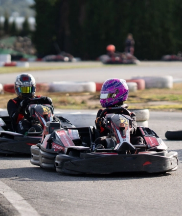 Two_people_are_driving_go-karts