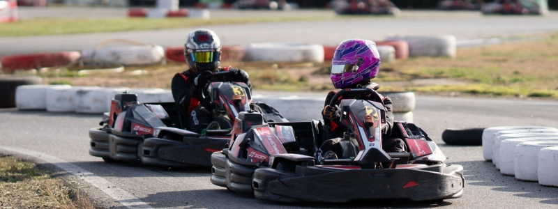 Two_people_are_driving_go-karts