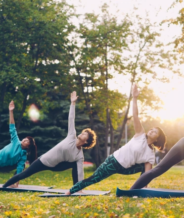 four_people_practice_yoga