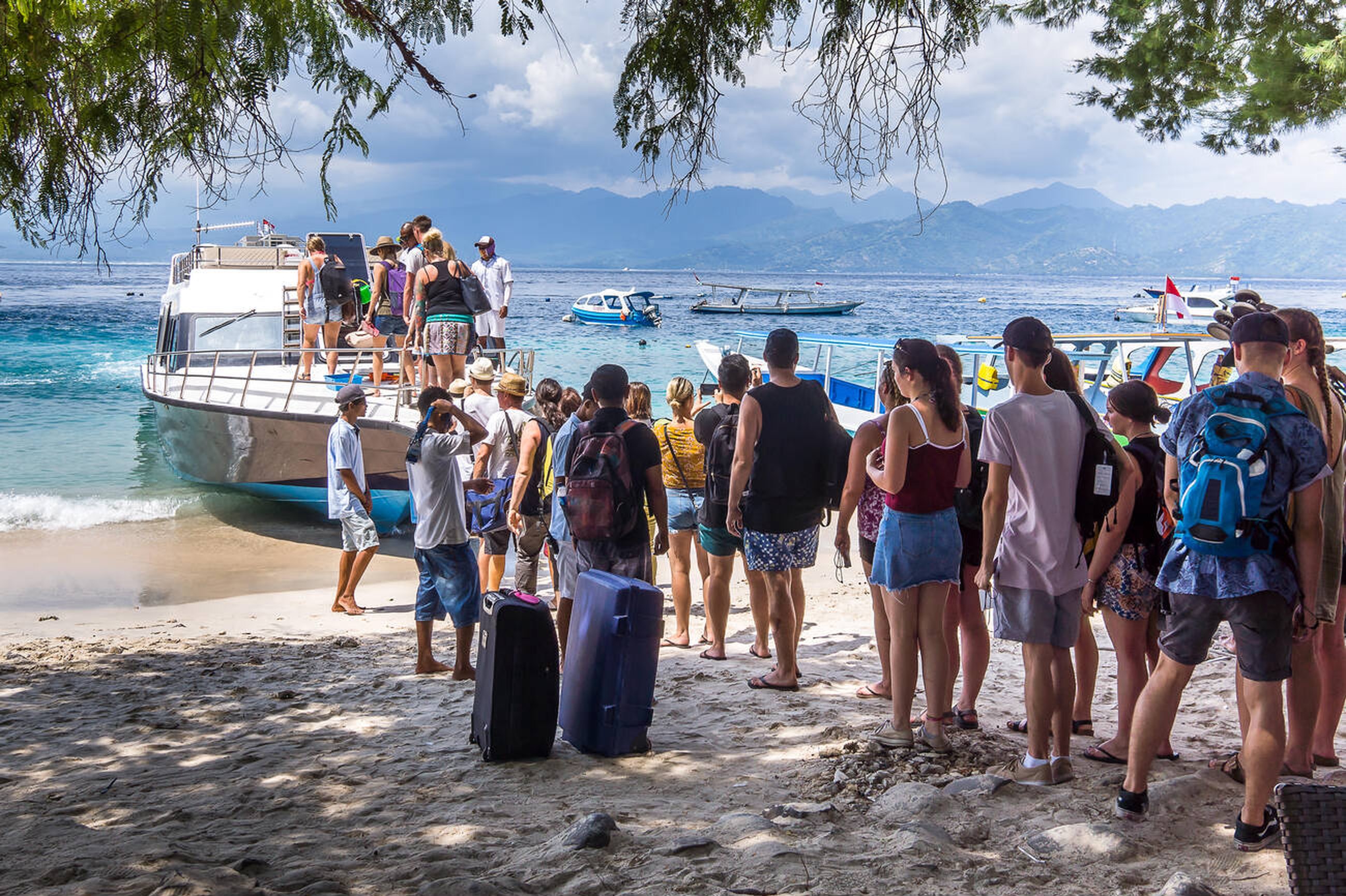 New Low-Cost Flights Make Bali-Lombok Travel Easier Than Ever - Tourist Queueing for Ferry Boat to Gili Island, Lombok