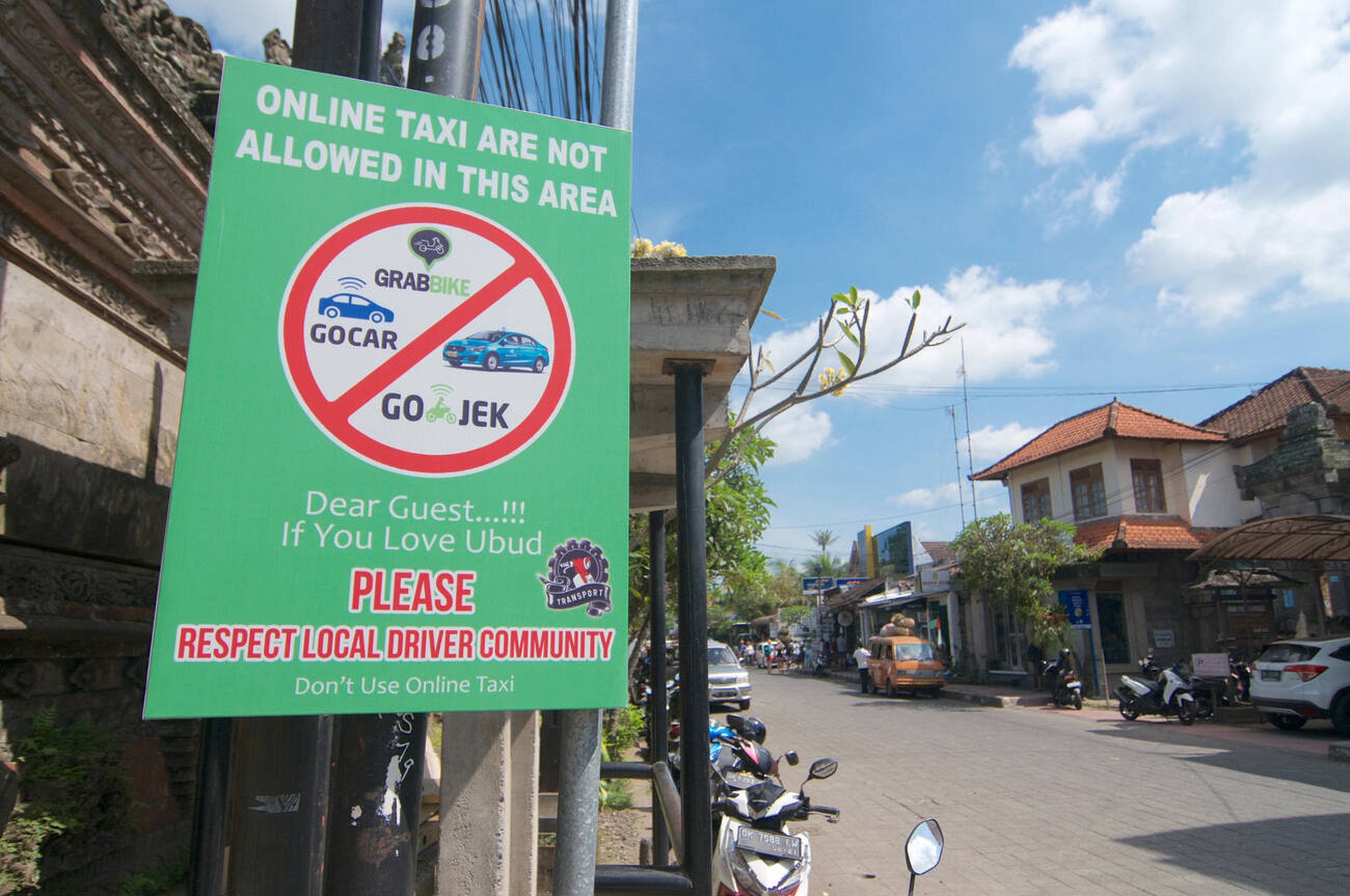 Sign Forbidding Online Taxi in Bali