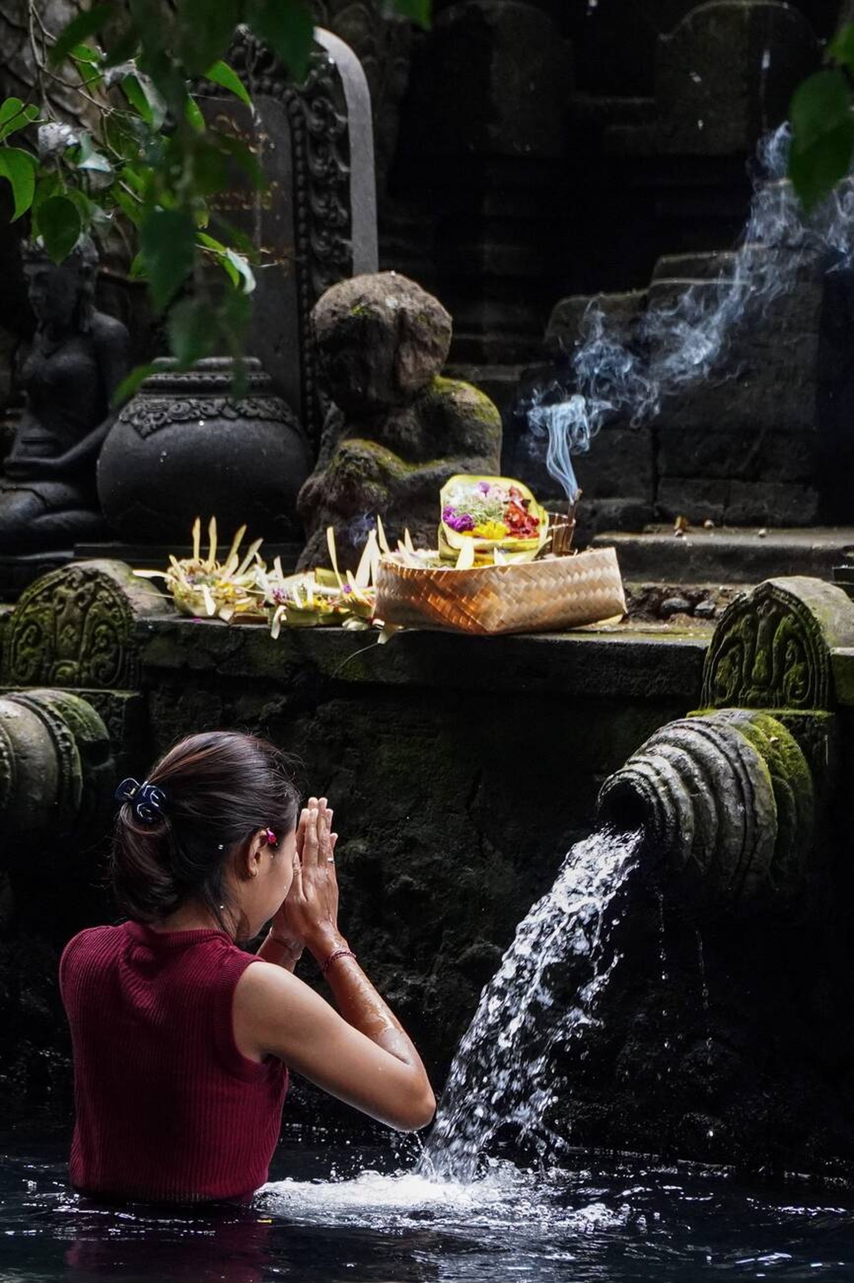 Woman commencing Banyu Pinaruh