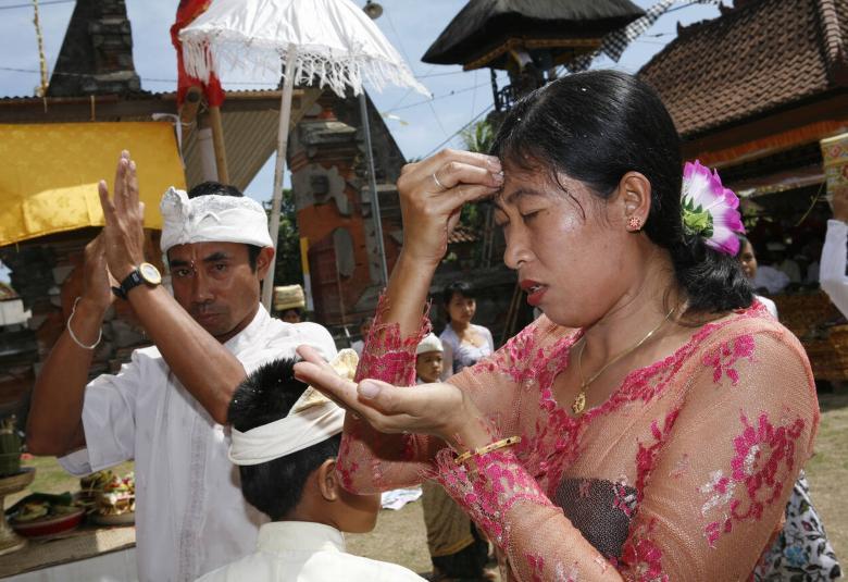 Blessed Rice Grains: The Significance of Bija in Balinese Ceremony