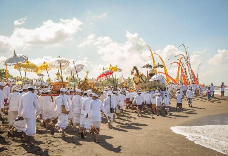 As a land blessed with vibrant culture and ancient traditions, there is a ritual which is considered as one of the most sacred in Bali - the Melasti Ceremony. A grand purification spectacle that precedes the tranquil Nyepi Day, Melasti is not merely a procession; it is a profound spiritual journey to cleanse both the human soul (Bhuwana Alit) and the entire universe (Bhuwana Agung) from impurities and negative influences.  The Virtuous Melasti Ceremony: Embracing Sacred Purification for Nyepi Day in Bali  M